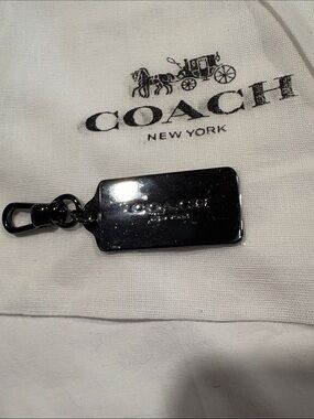 NWOT Coach Shiny Gunmetal Metal Dog Tag Keychain